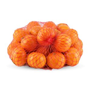 Mesh bag of fresh organic mandarins on a white background