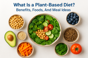 Colorful plant-based foods with vegetables, legumes, fruits, and a bowl of salad arranged together